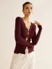 Wave Trim Cutout Slim Knit Top sold by COMMENSE