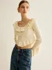 Ruffle Botton Knit Top sold by COMMENSE