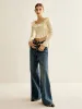 Ruffle Botton Knit Top sold by COMMENSE
