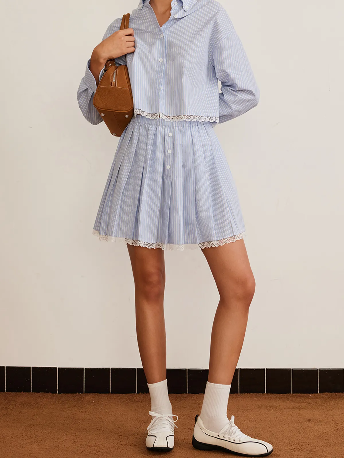 Lace Trim Button Pleated Skirt sold by COMMENSE