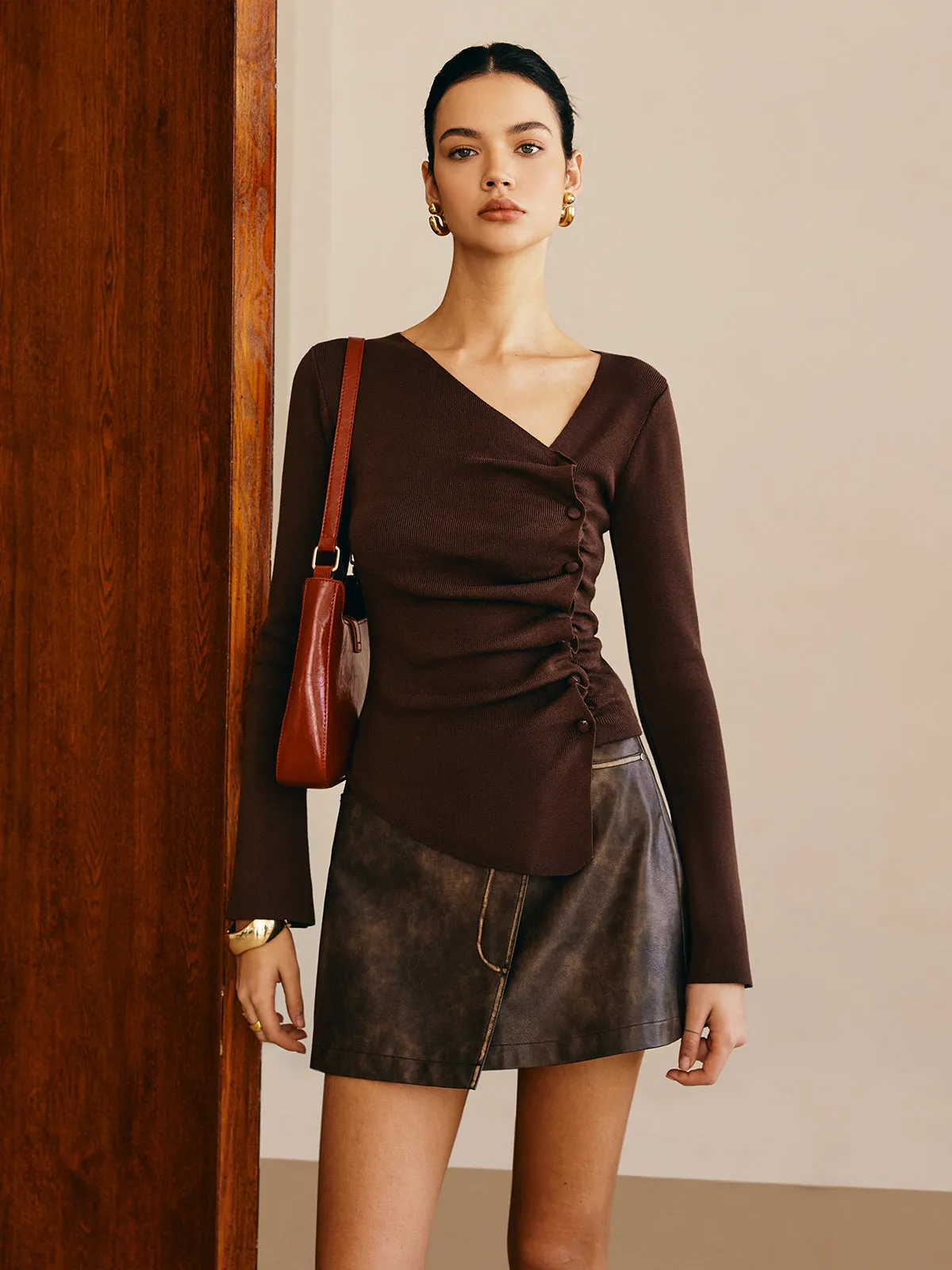 Asymmetrical Pleated Slim Sweater sold by COMMENSE