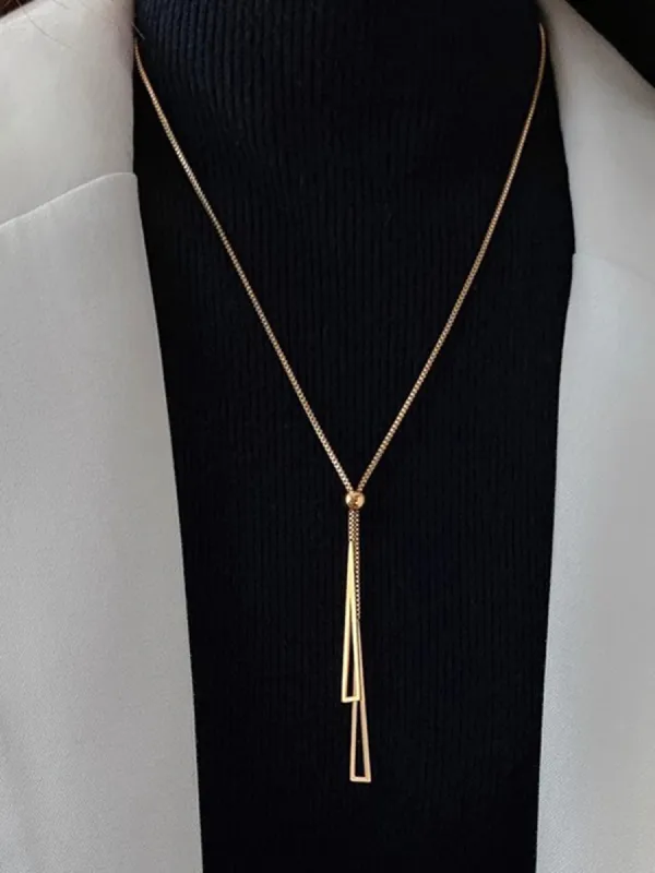 Golden Lariat Tassel Necklace sold by COMMENSE