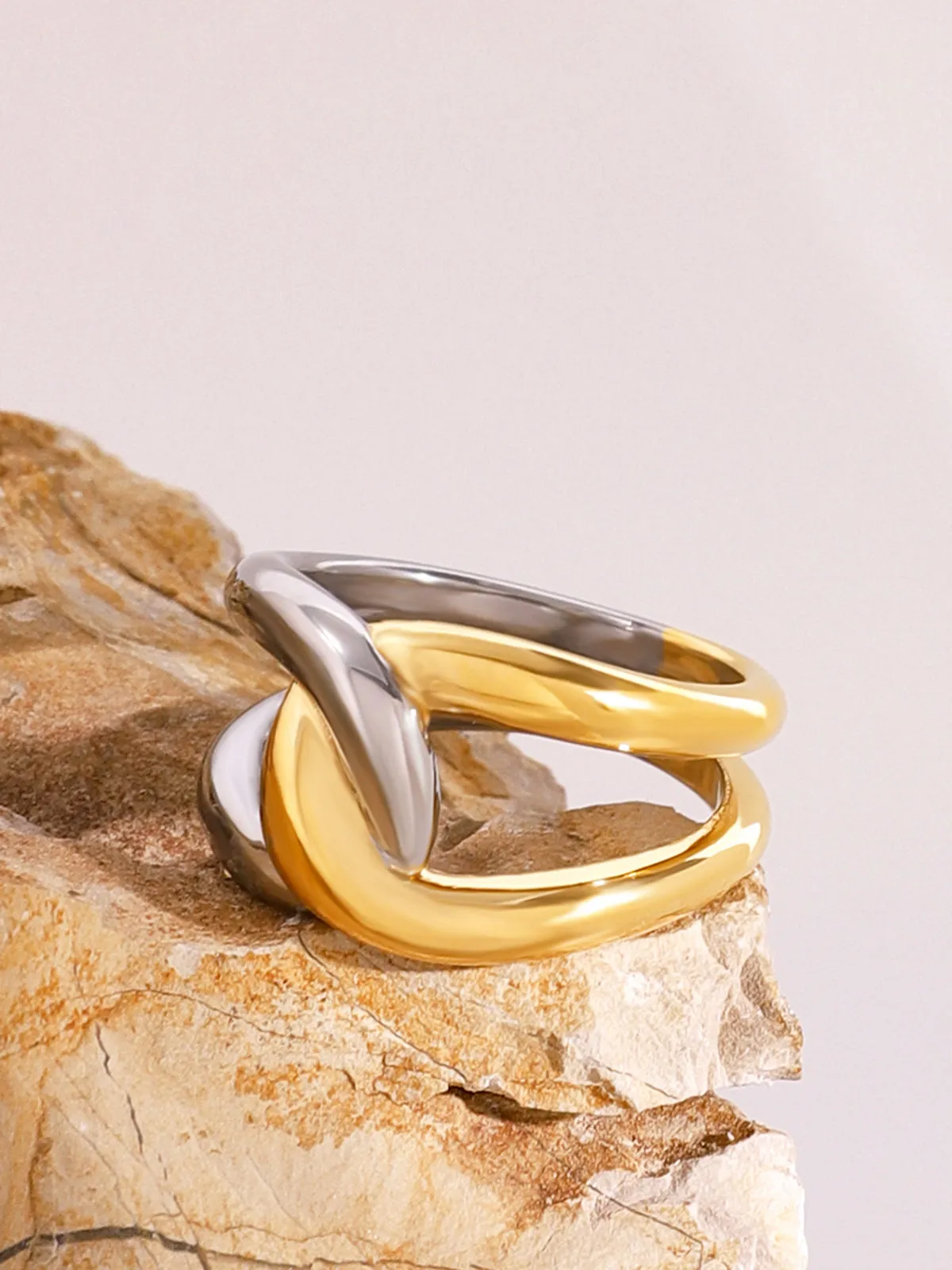 Two Tone Twist Ring sold by COMMENSE