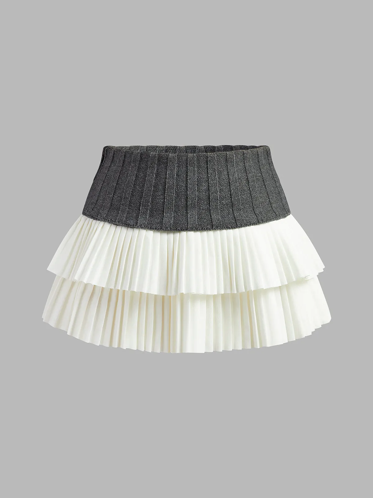 Two-Tone Pleated Mini Skirt sold by COMMENSE