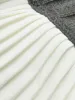 Two-Tone Pleated Mini Skirt sold by COMMENSE