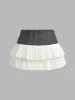 Two-Tone Pleated Mini Skirt sold by COMMENSE