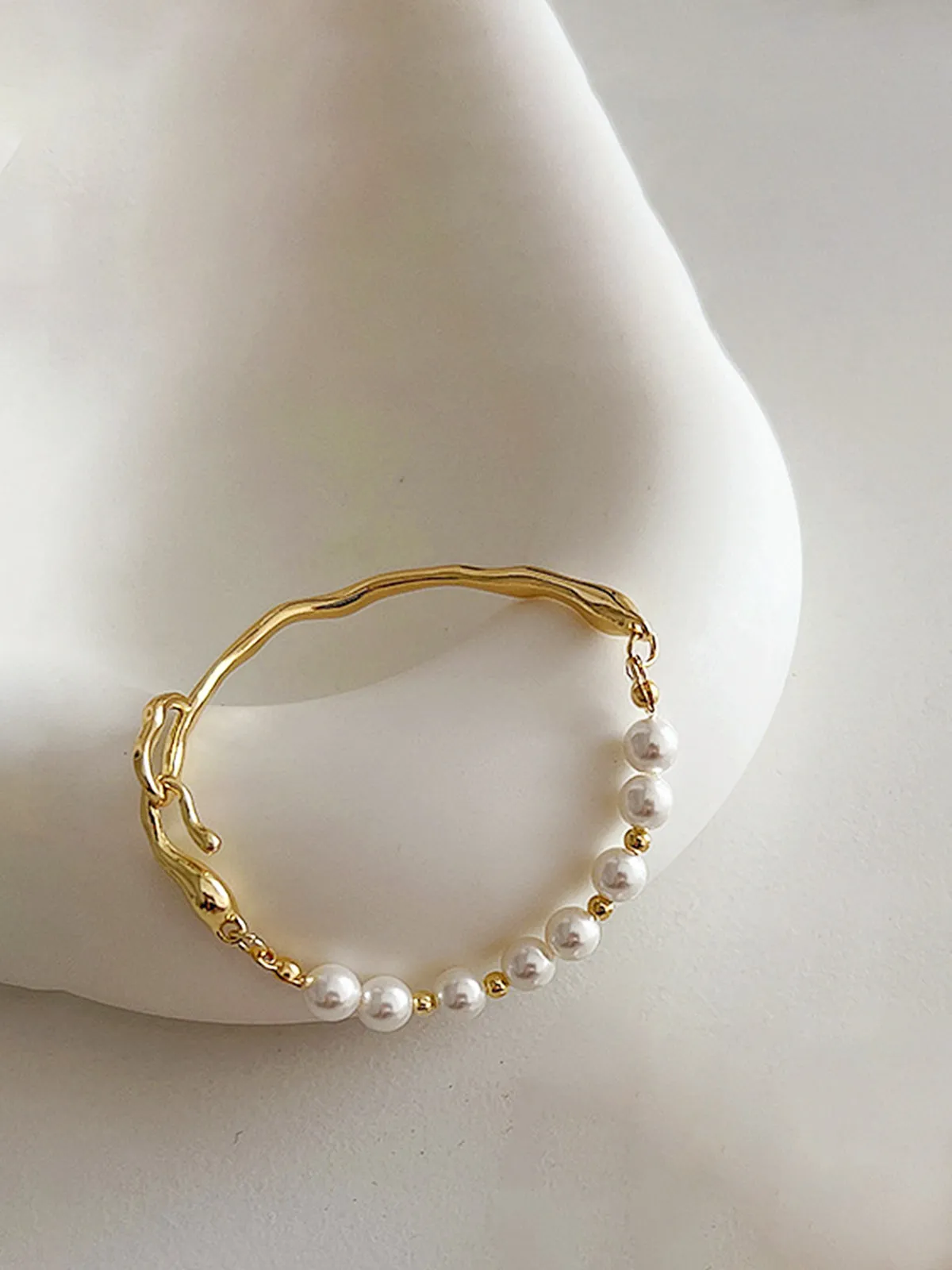 Irregular Metal Pearl Bracelet sold by COMMENSE