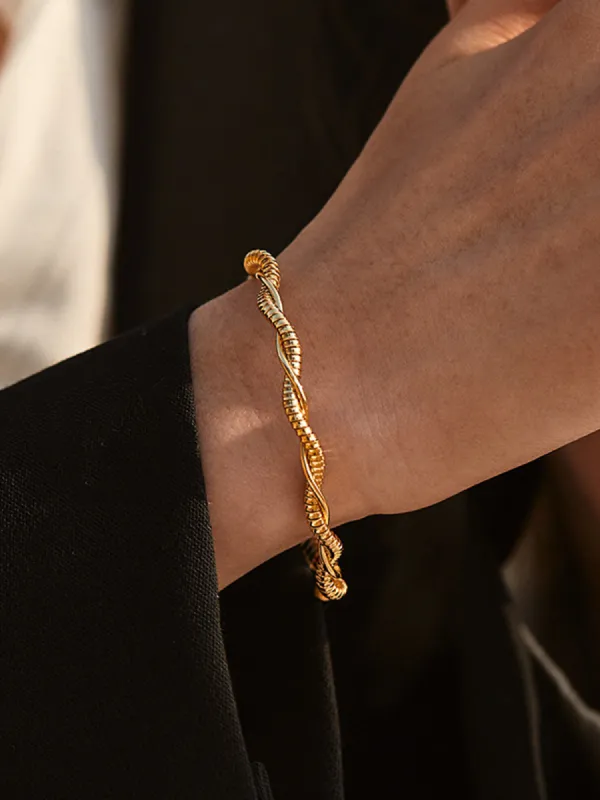 Minimalist Twist Open Bracelet sold by COMMENSE