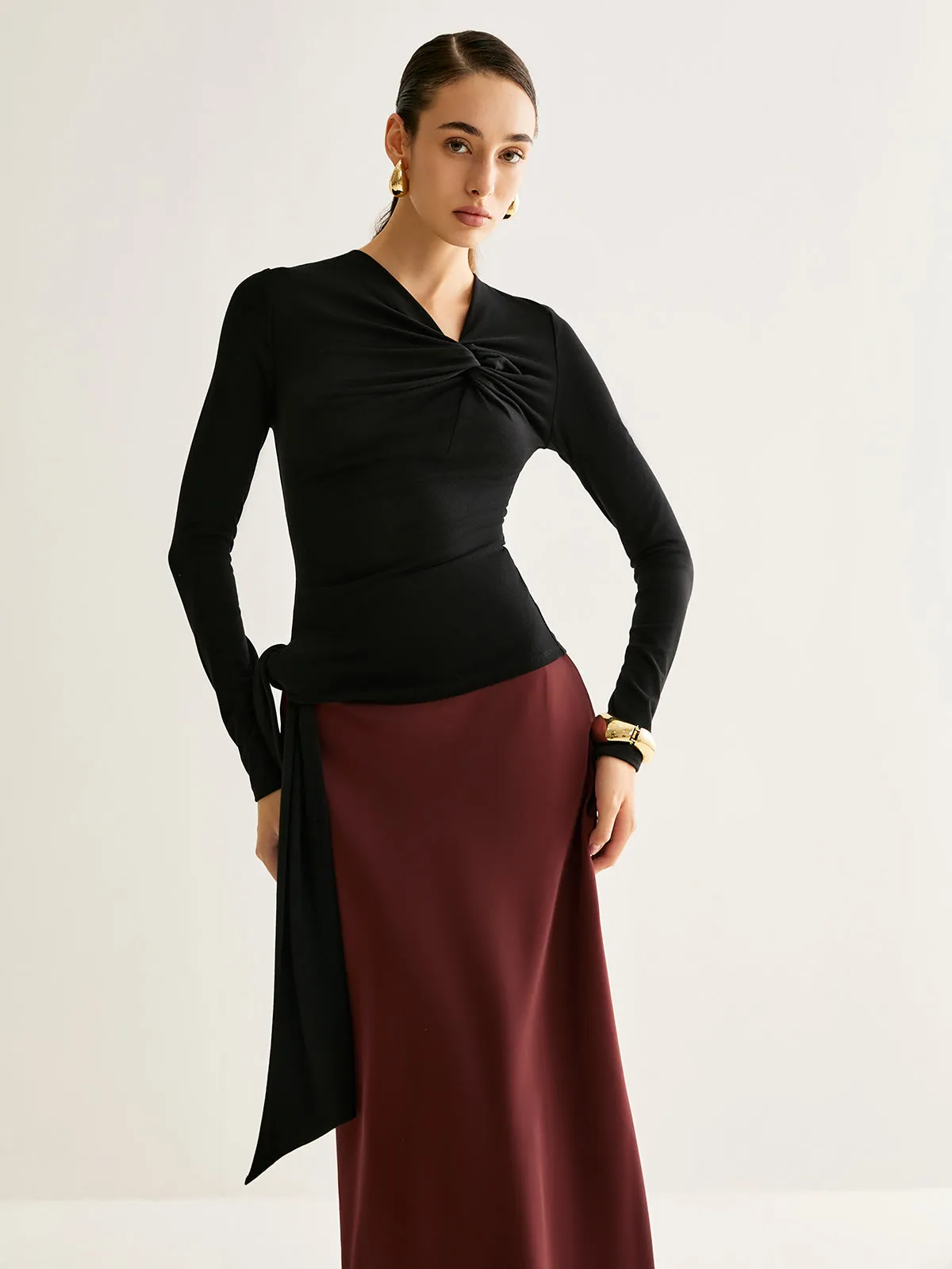 Asymmetrical Neck Knotted Slim Top sold by COMMENSE