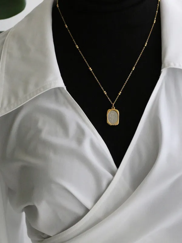 Embossed Rose Square Pendant Necklace sold by COMMENSE