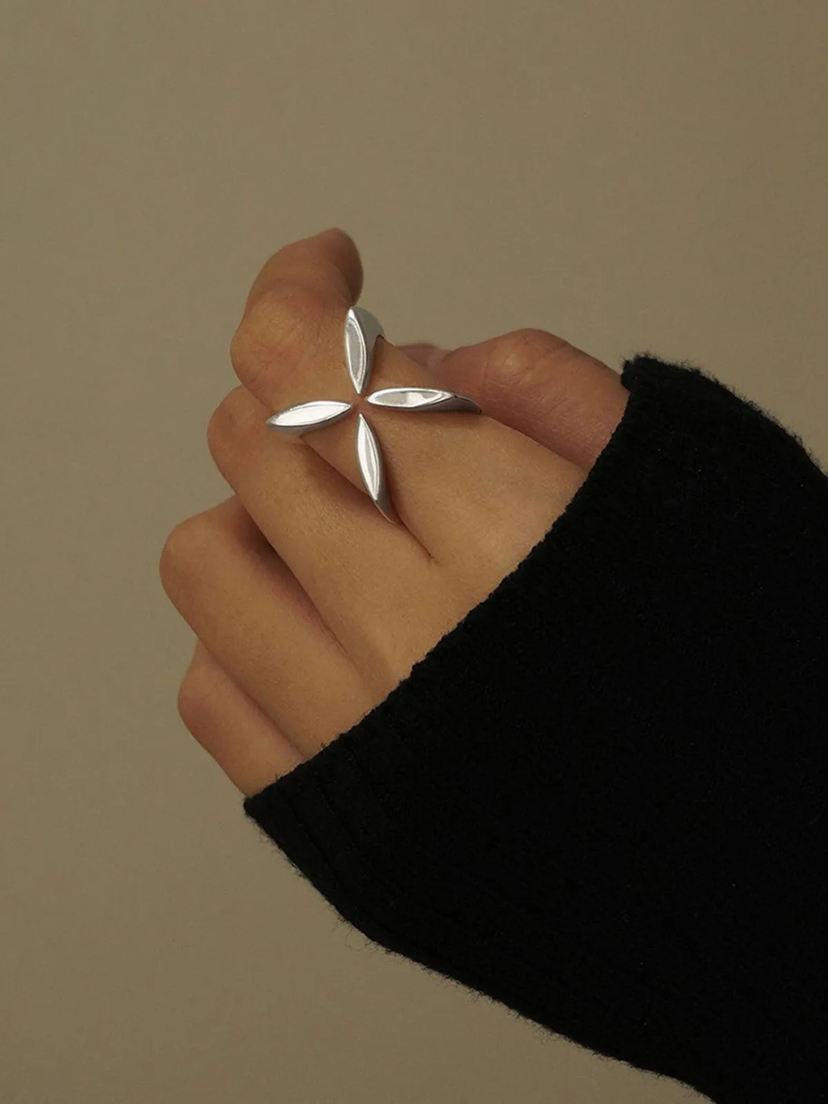 Criss Cross Four-Leaf Open Ring sold by COMMENSE