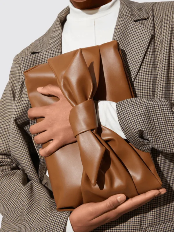 Bow Tofu Clutch Bag sold by COMMENSE