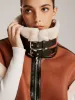 Fleece Lined Faux Leather Buckle Vest sold by COMMENSE