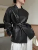 Stand Collar Belted Faux Leather Jacket sold by COMMENSE