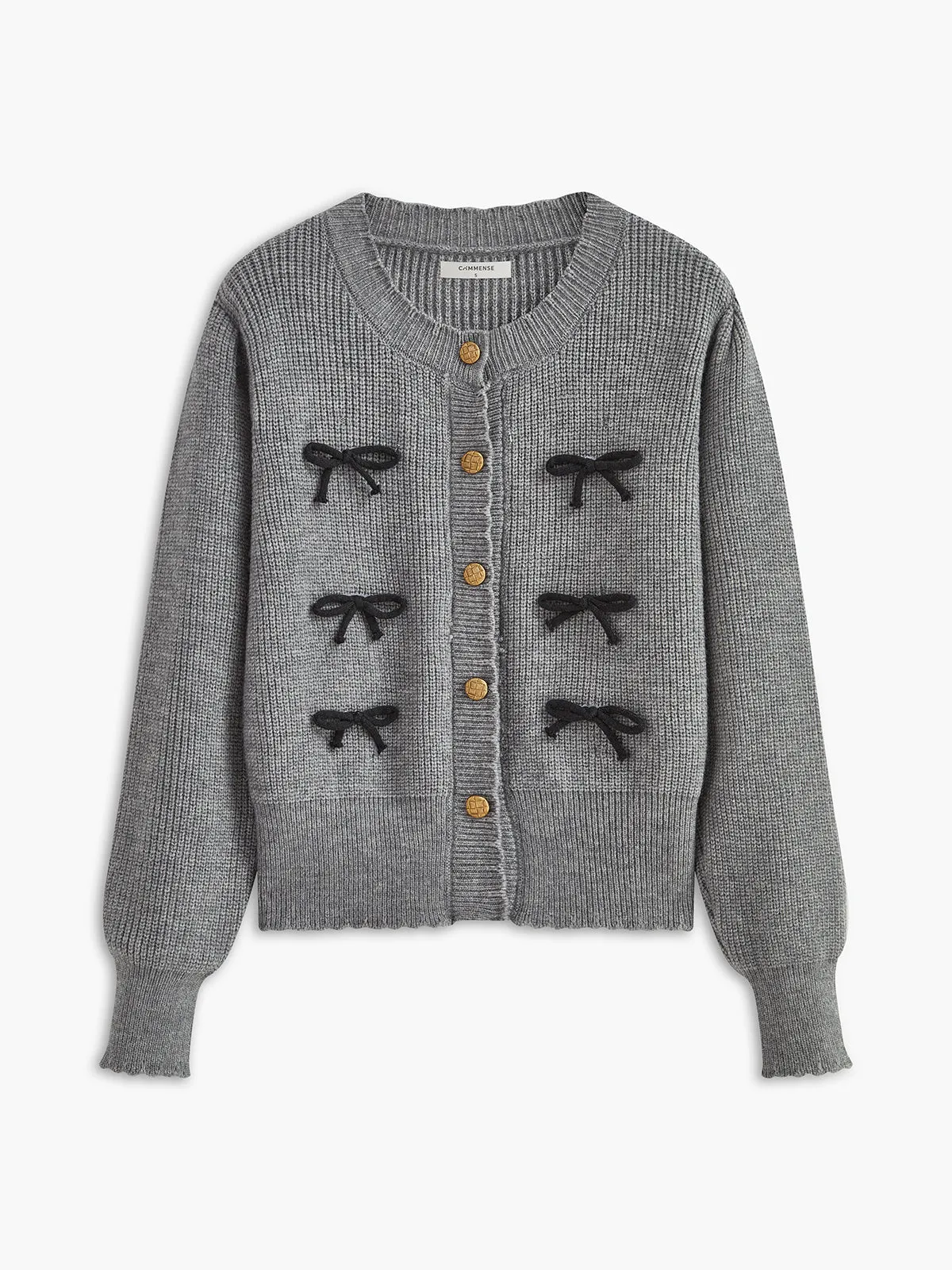 Wave Trim Button Bow Cardigan sold by COMMENSE