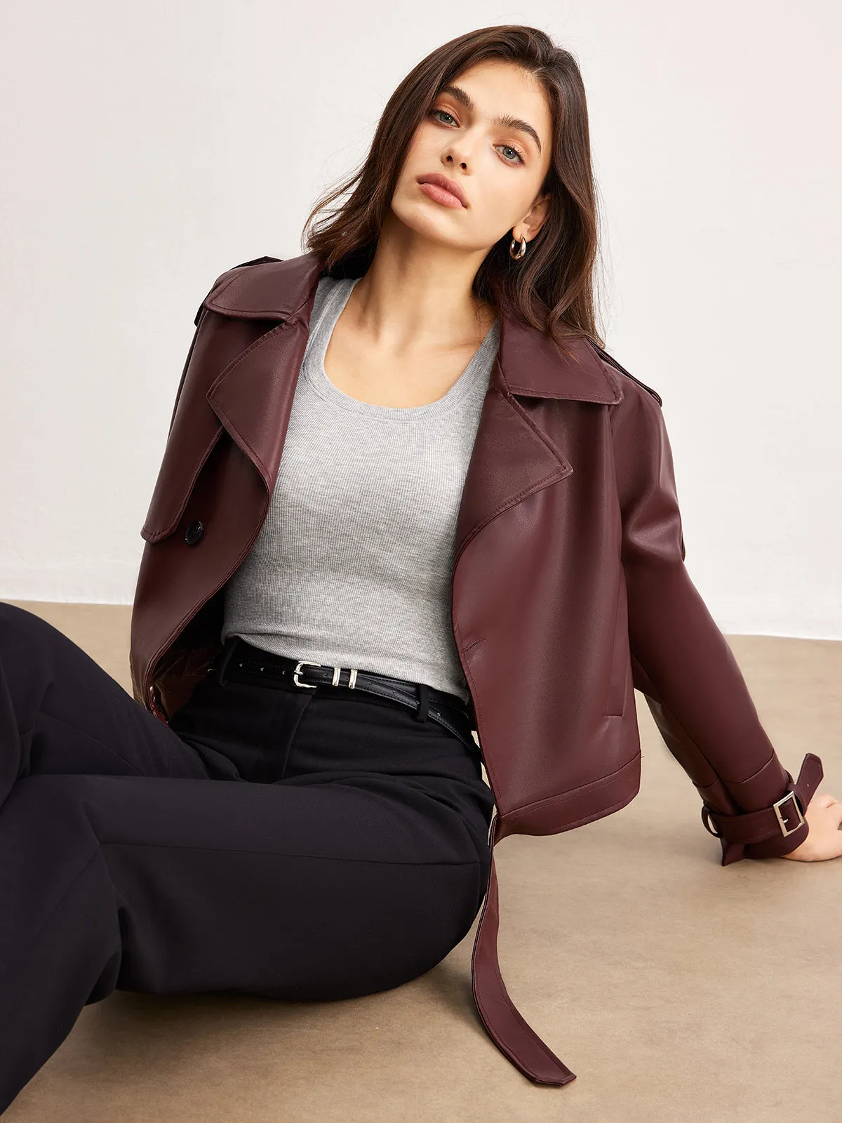 Faux Leather Belted Short Jacket sold by COMMENSE
