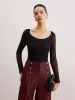 Ribbed Sheer Sleeve Sweater sold by COMMENSE