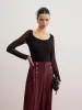 Ribbed Sheer Sleeve Sweater sold by COMMENSE