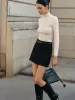Melt Belted Mini Skirt sold by COMMENSE