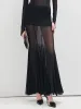 Ruffle Sheer Panel Maxi Skirt sold by COMMENSE