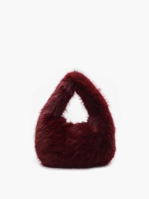Rounded Fuzzy Handbag sold by COMMENSE