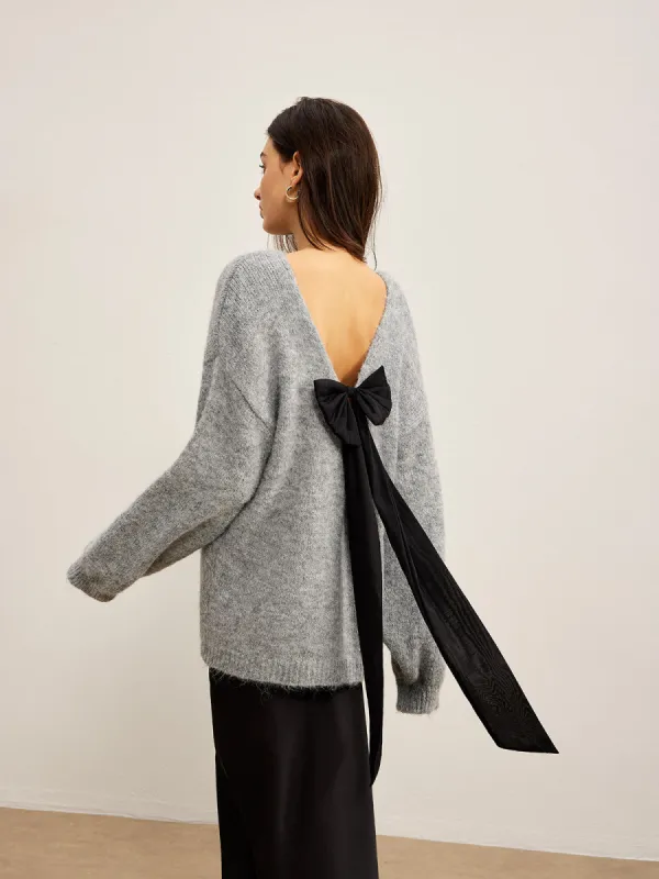 Backless Bow Shift Sweater sold by COMMENSE
