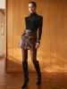 Two-Way Zip Faux Leather Skirt sold by COMMENSE