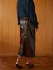 Pocket Split Faux Leather Skirt sold by COMMENSE