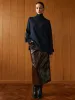 Pocket Split Faux Leather Skirt sold by COMMENSE