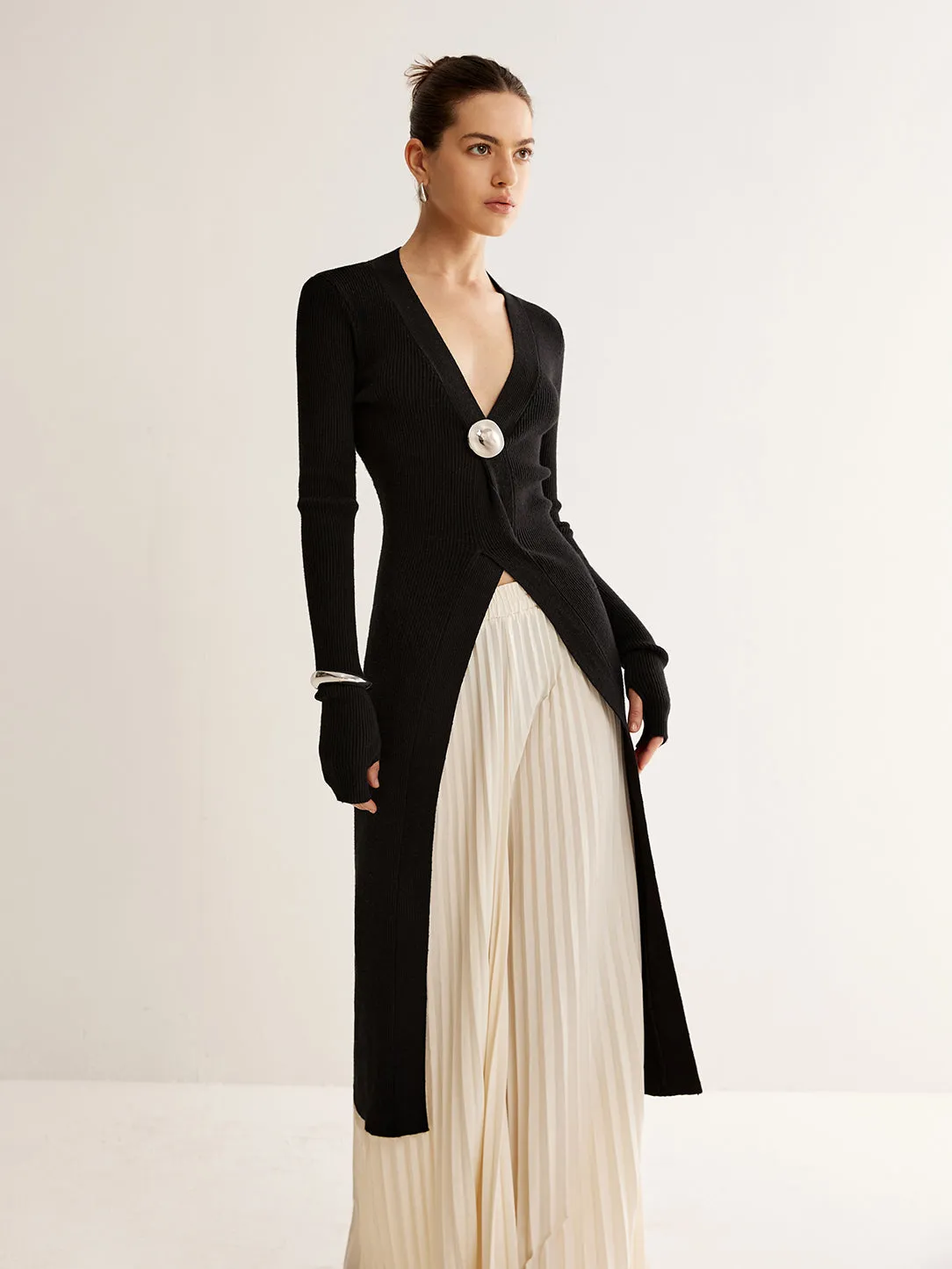 Metal Decor Split Knit Long Top sold by COMMENSE