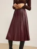 Faux Leather Pleated Midi Skirt sold by COMMENSE