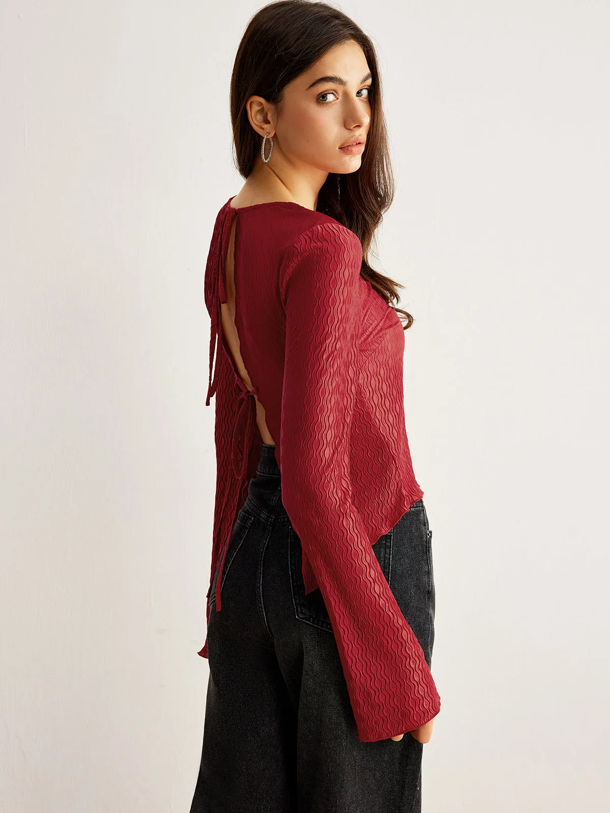 Curve Textured Backless Tie Blouse sold by COMMENSE