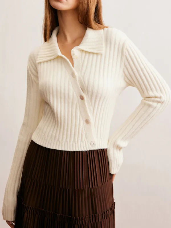 Romance Asymmetrical Button Polo Knit Top sold by COMMENSE