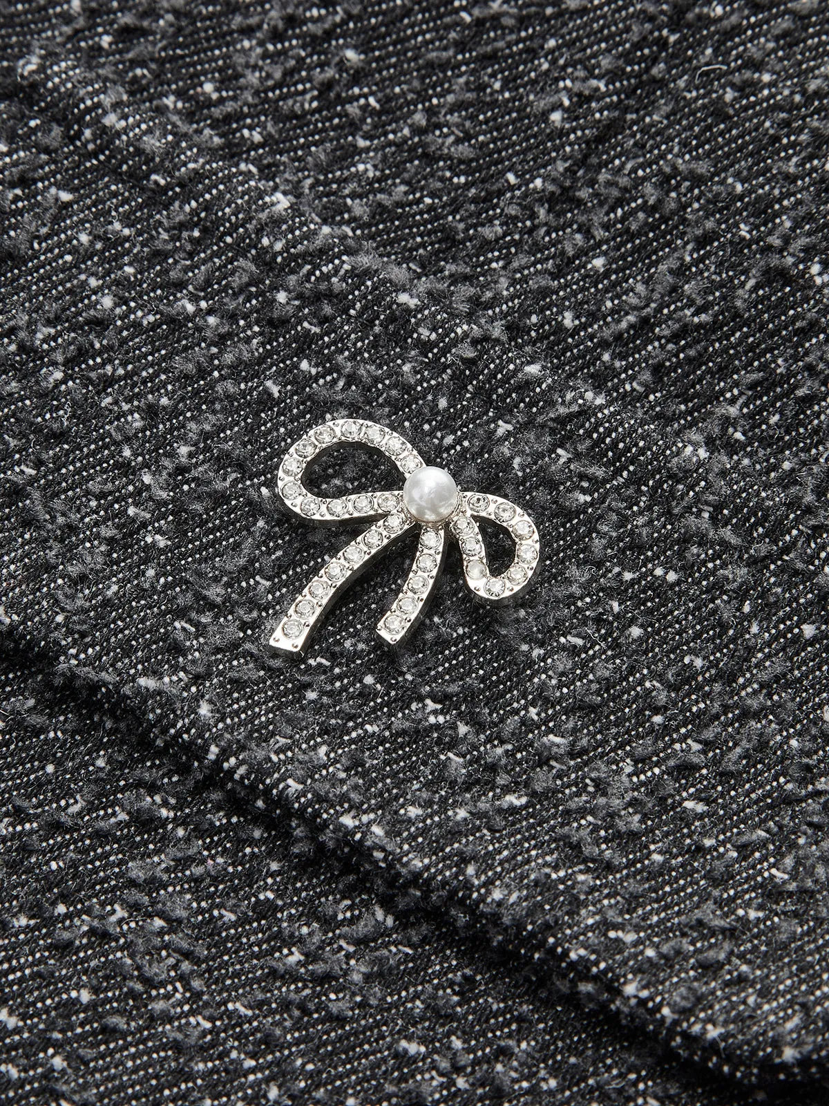 Metal Bow Denim Mini Skirt sold by COMMENSE product image thumbnail 2