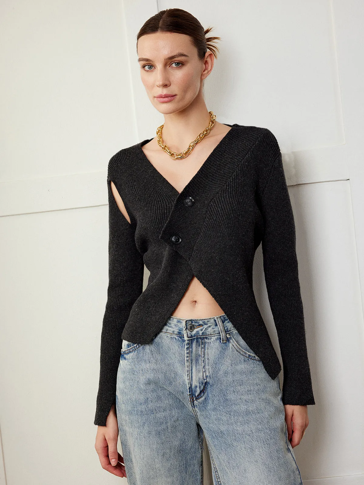 Asymmetrical Cutout Button Knit Top sold by COMMENSE