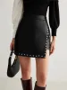 Slit Studded Faux Leather Mini Skirt sold by COMMENSE