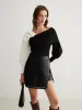 Slit Studded Faux Leather Mini Skirt sold by COMMENSE