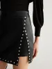 Slit Studded Faux Leather Mini Skirt sold by COMMENSE