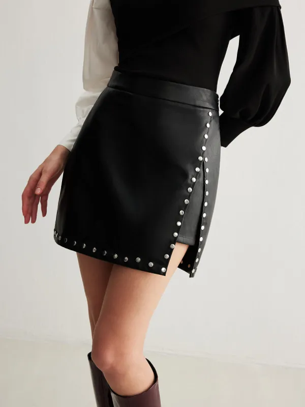 Slit Studded Faux Leather Mini Skirt sold by COMMENSE