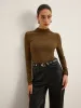 Mock Neck Asymmetical Pleated Top sold by COMMENSE