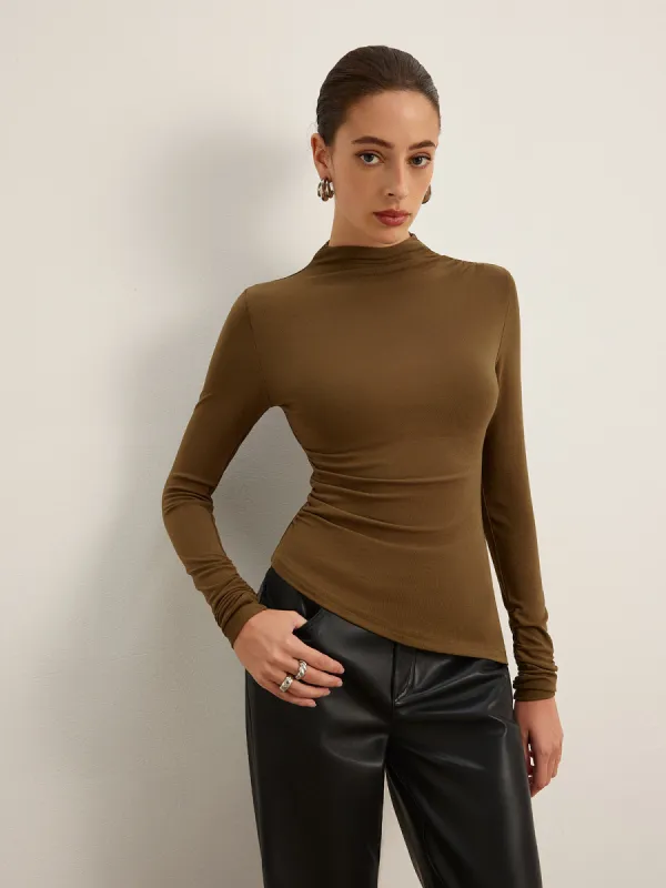 Mock Neck Asymmetical Pleated Top sold by COMMENSE