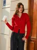 3D Flower Button Pleated Cardigan sold by COMMENSE