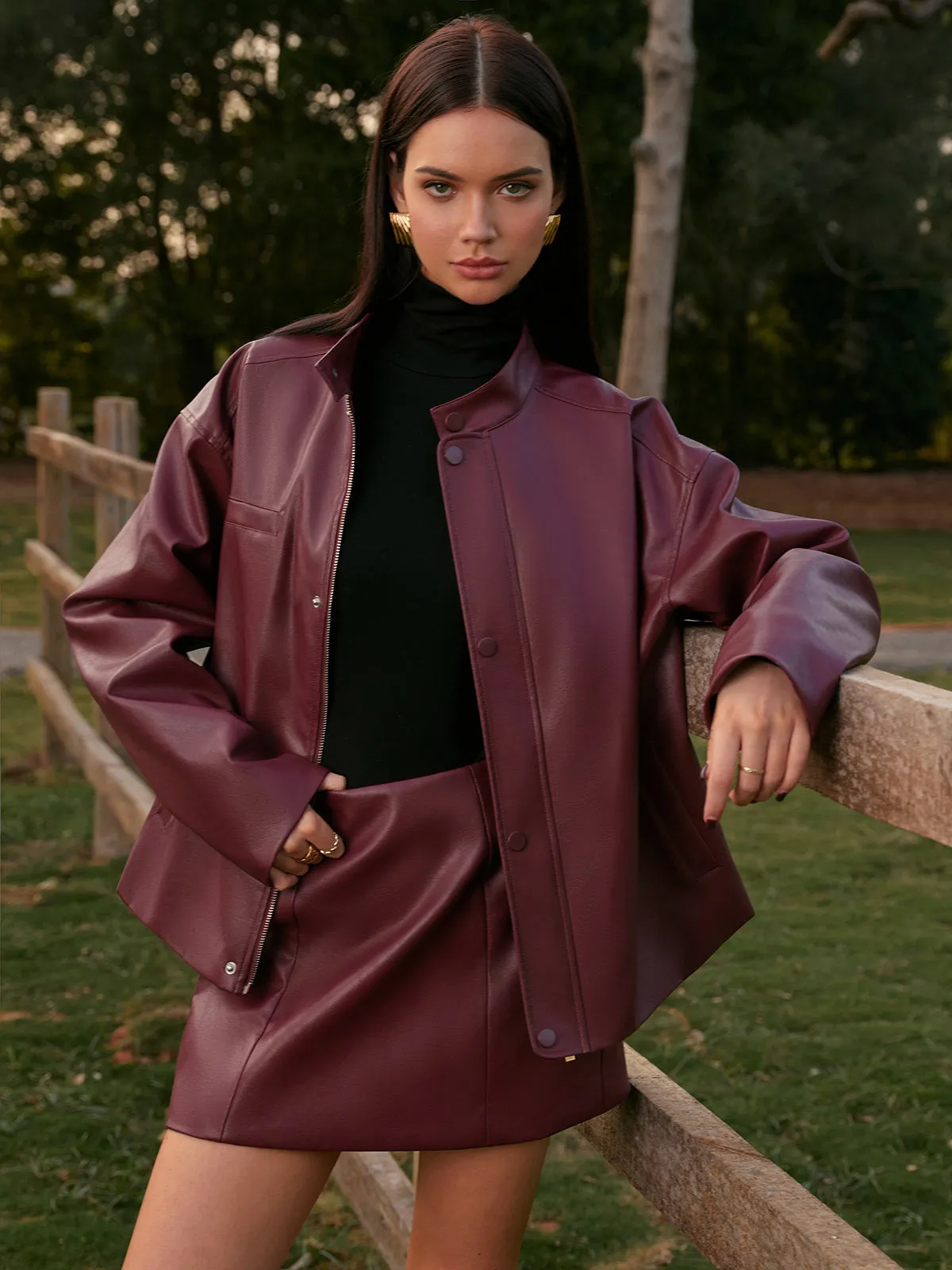 Stand Collar Faux Leather Zipper Jacket sold by COMMENSE