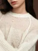Wool-Blend Semi-Sheer Shift Knit Top sold by COMMENSE