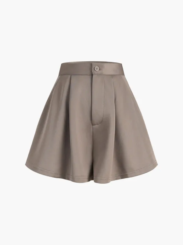 Utility Buttoned Pleat Shorts sold by COMMENSE