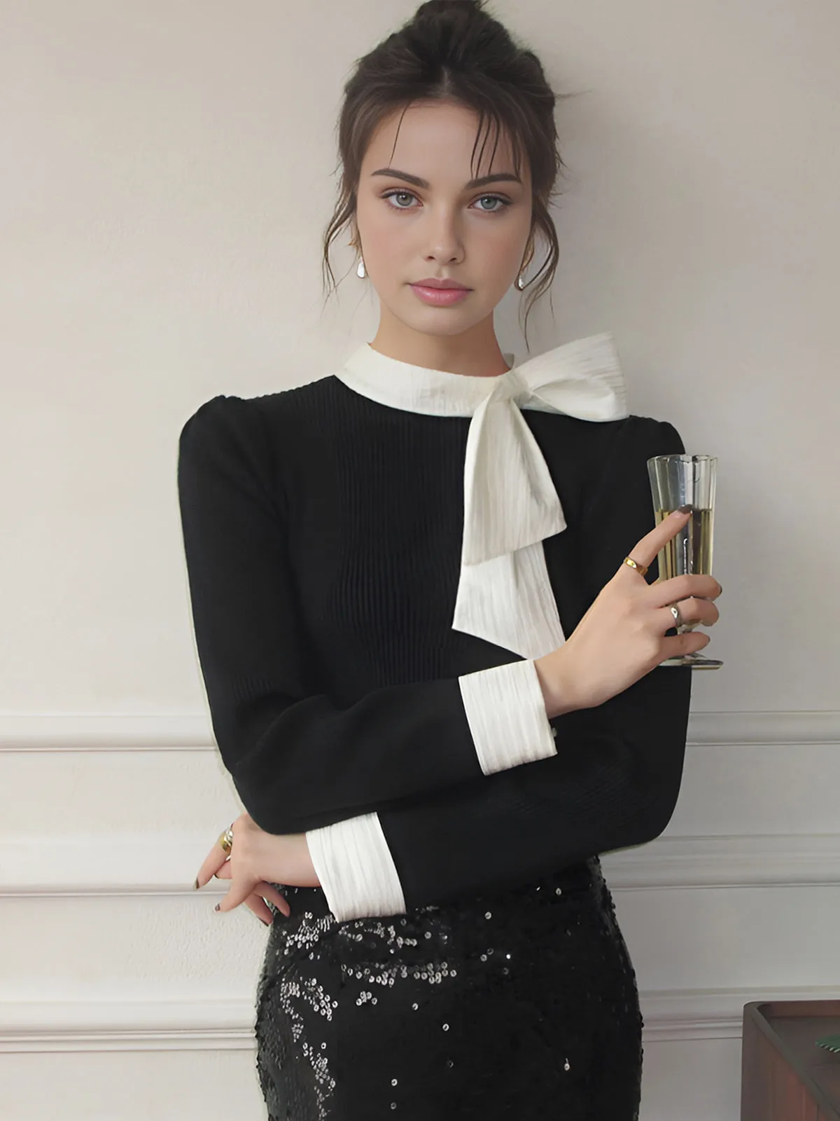 Color Block Bow Knit Top sold by COMMENSE