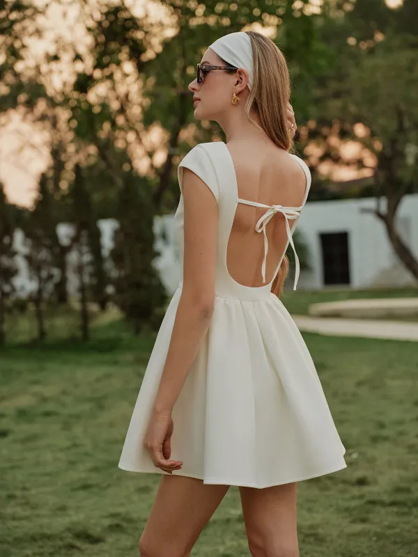 Back Tie Pleated Panel Dress sold by COMMENSE