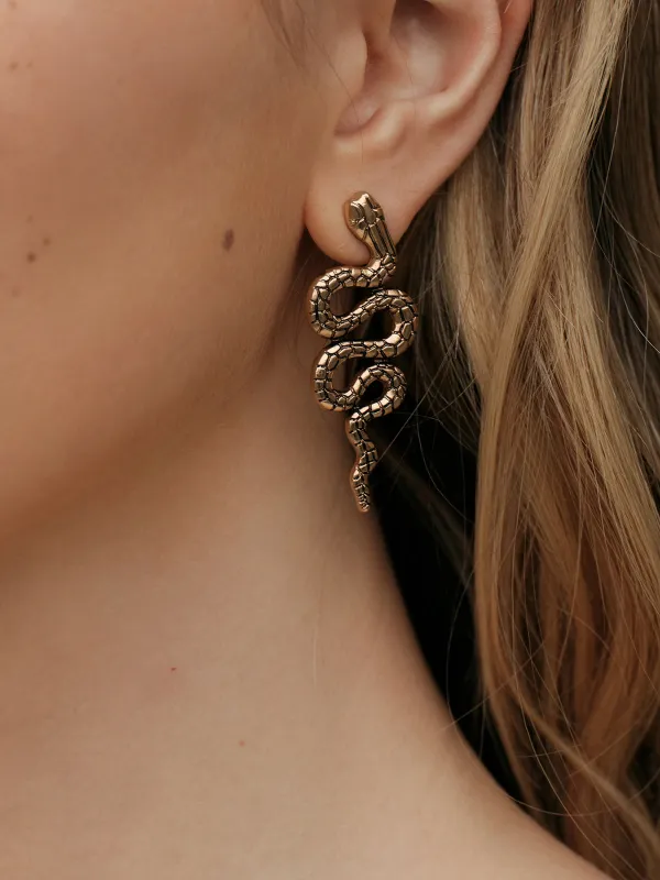 Snake Shaped Stud Earrings sold by COMMENSE
