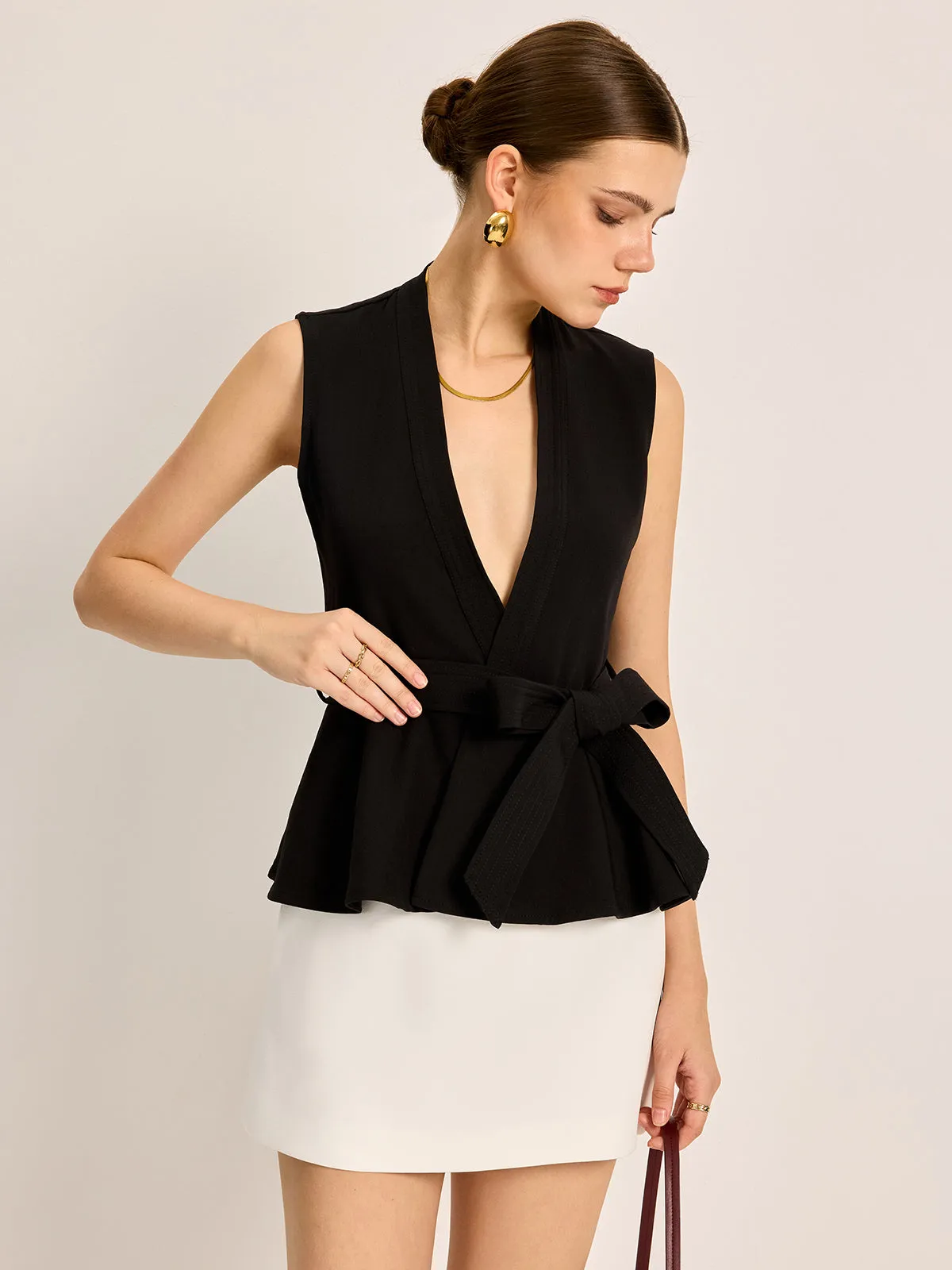 Belted V-Neck Sleeveless Top sold by COMMENSE