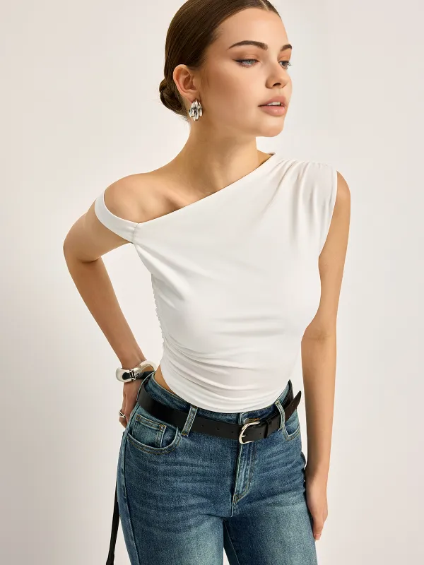 Asymmetrical Cutout Ribbed Top sold by COMMENSE